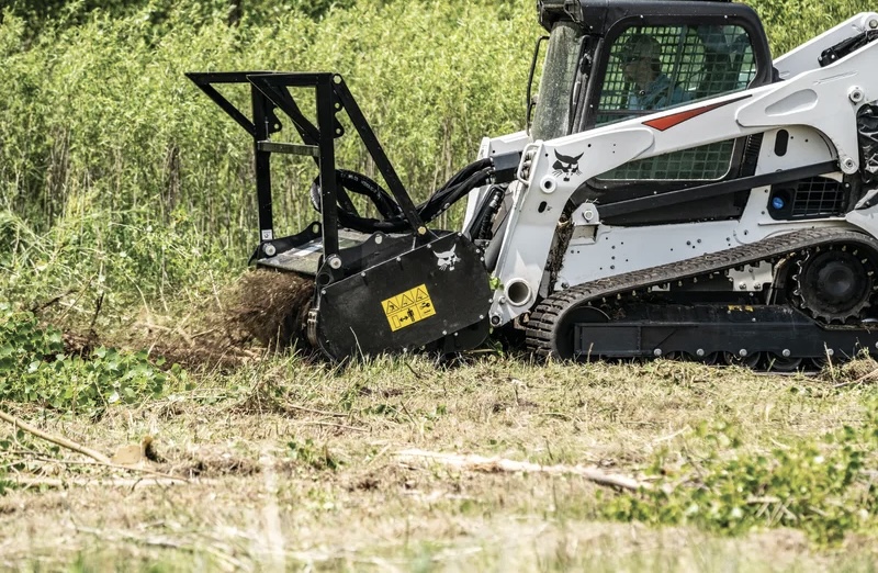 Forestry mulching equipment clearing brush in the Texas Hill Country